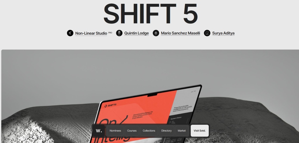 Главная страница awwwards с обзором проекта site of the day shift 5 на фоне камней.